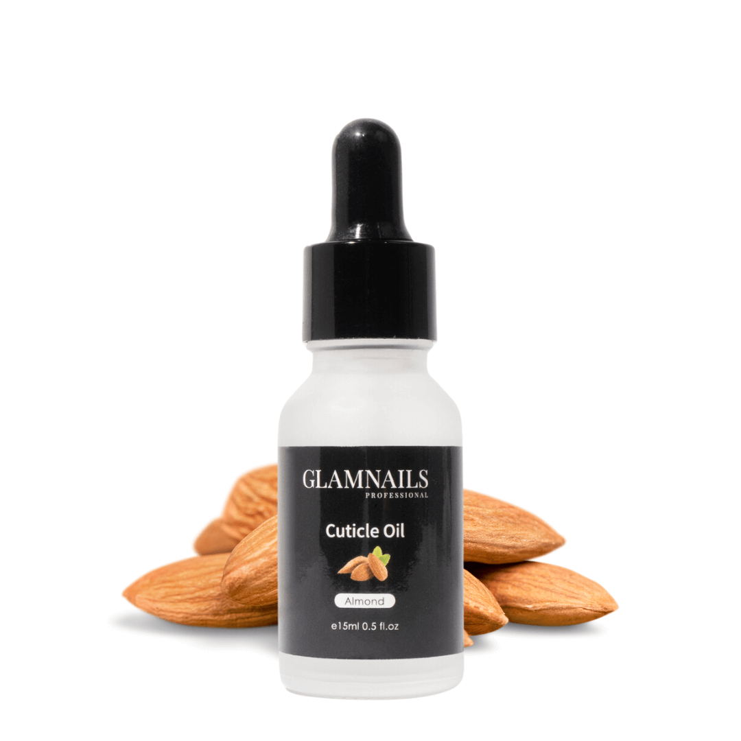 GlamNails cuticle oil almond flavor bottle surrounded by almonds for nourishing nail and cuticle care.